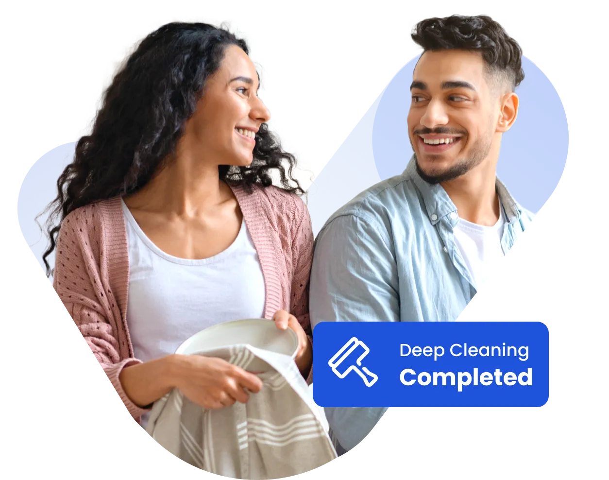 A man and a woman smiling and holding a dish.