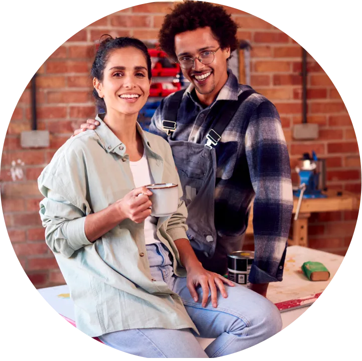 A man and a woman sitting next to each other.