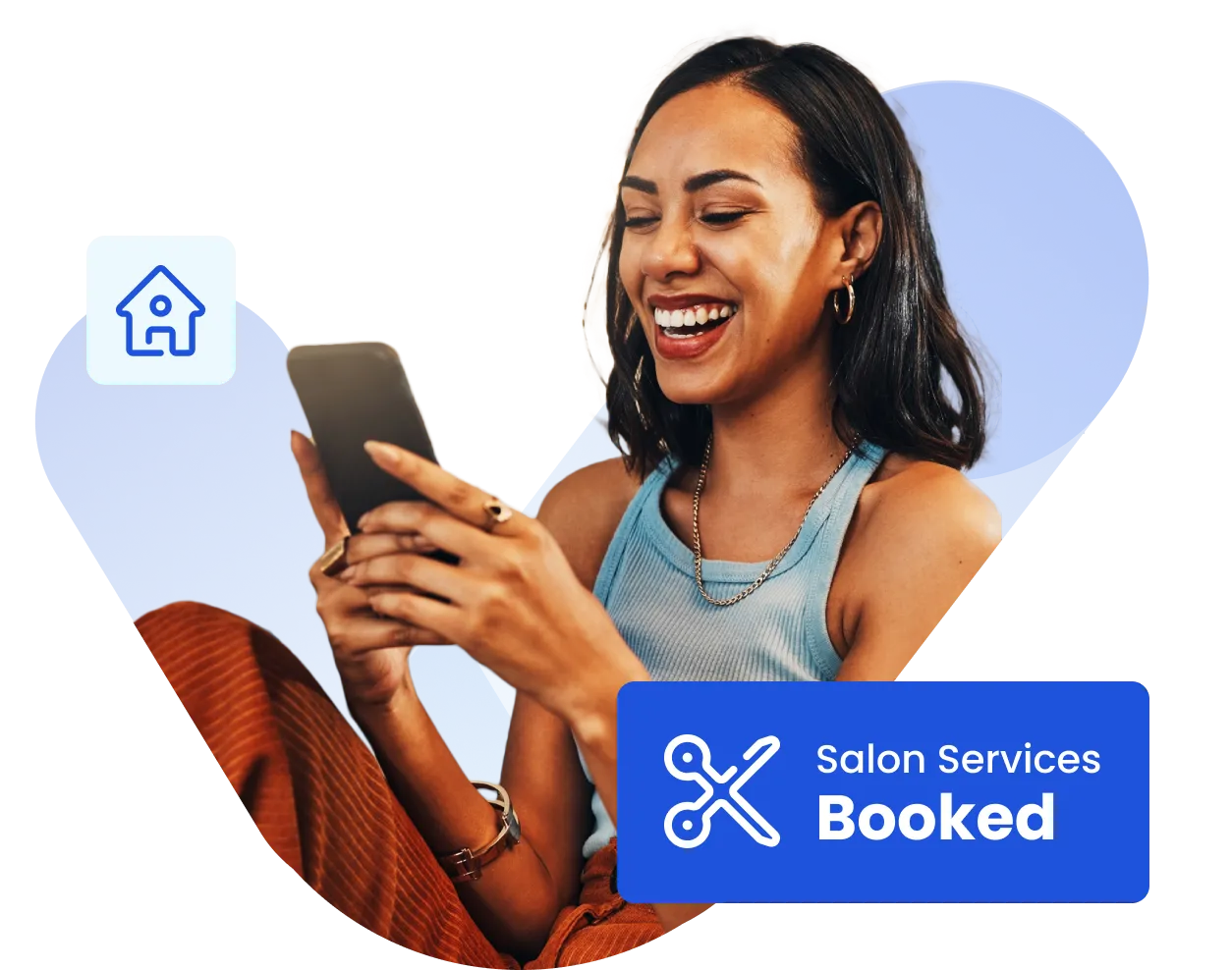 A woman smiling while looking at a tablet.